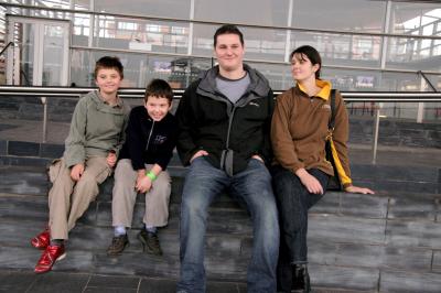 caption popup|David and Sharon in 2007 with Jack and Alex, before they grew too tall to fit in the house. 