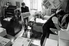 caption popup|Paid print workers Rick and Adrian in the Cwmbran Community Press Print Room rolling out an edition of Checkpoint. Rick, who started as a school leaver on a government scheme and Adrian who went on to run the Print Room at County hall were among around a dozen unemployed young people who learned to become proficient printers on our two offset litho machines. 